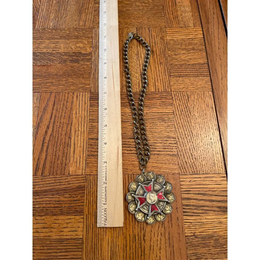 Costume jewelry gold tone coin statement piece
